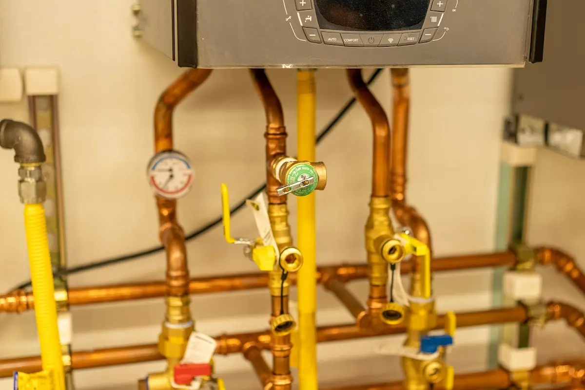 Licensed technician providing Backflow Prevention for a homeowner in Forsyth